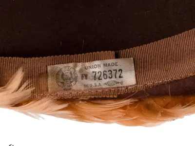 Made by Marshall Field & Company of Chicago, probably in the 1960s. A second label shows the hat was made by United Hatters, Cap and Millinery Workers International. 