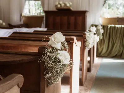 Cameron Church, interior pews with flowers.