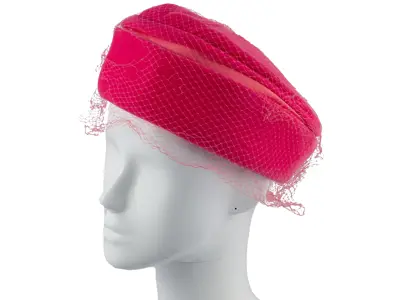 Pink crushed velvet pillbox hat with pink net veil, belonged to Hazel Davidson.