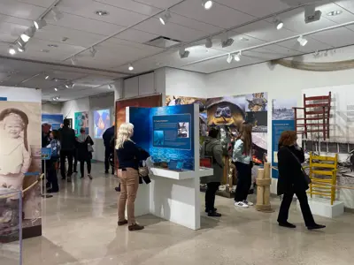 Visitors explore the feature exhibition Bluewaterland at Lambton Heritage Museum.