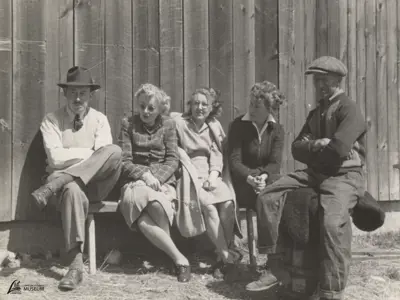 Eric McIlroy of Grand Bend wears a fedora on the far left. His companion on the far right opted for a flat cap. Eric’s wife Ella is seated beside him.
